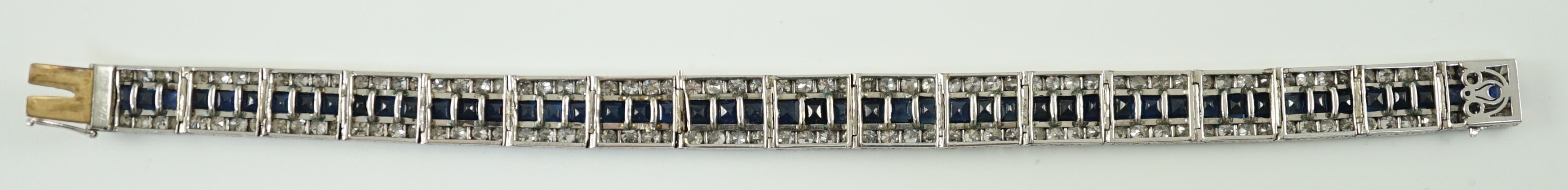 A 1920’s white gold, sapphire and diamond set triple line bracelet